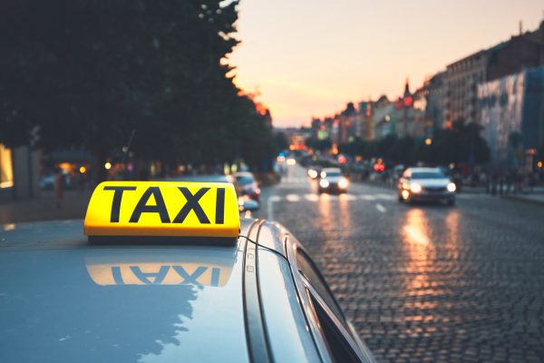 taxi-car-on-the-city-street.jpg